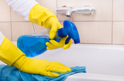 Cleaning technician preparing equipment before a scheduled visit