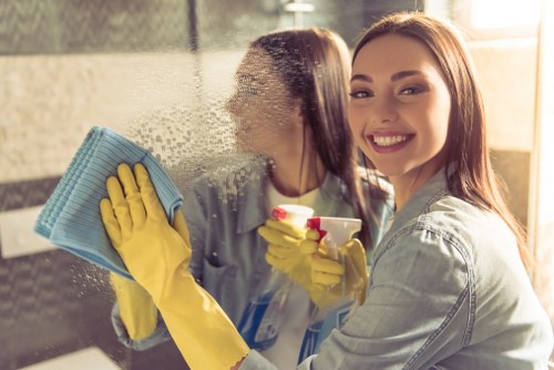 Cleaner reviewing a service booking and quotation details